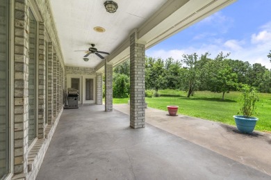 Elegantly perched in the prestigious Rayburn Country Subdivision on Rayburn Country Club in Texas - for sale on GolfHomes.com, golf home, golf lot