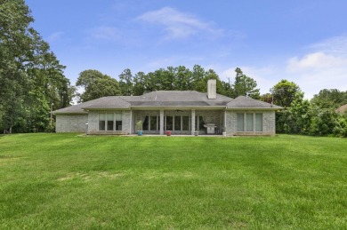 Elegantly perched in the prestigious Rayburn Country Subdivision on Rayburn Country Club in Texas - for sale on GolfHomes.com, golf home, golf lot