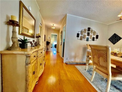 Lovely home with a new A/C in 2021. New washer & dryer and on Indianwood Golf and Country Club in Florida - for sale on GolfHomes.com, golf home, golf lot