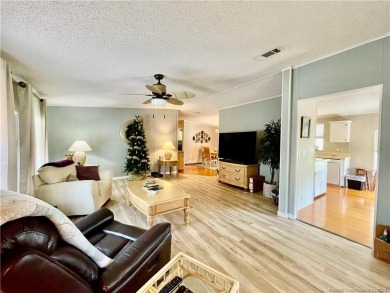 Lovely home with a new A/C in 2021. New washer & dryer and on Indianwood Golf and Country Club in Florida - for sale on GolfHomes.com, golf home, golf lot