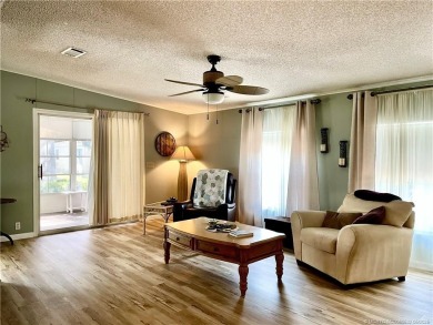 Lovely home with a new A/C in 2021. New washer & dryer and on Indianwood Golf and Country Club in Florida - for sale on GolfHomes.com, golf home, golf lot