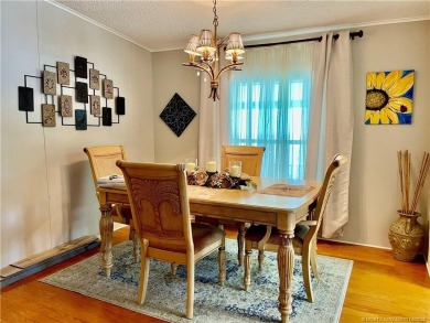 Lovely home with a new A/C in 2021. New washer & dryer and on Indianwood Golf and Country Club in Florida - for sale on GolfHomes.com, golf home, golf lot