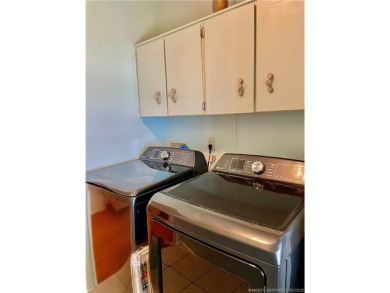 Lovely home with a new A/C in 2021. New washer & dryer and on Indianwood Golf and Country Club in Florida - for sale on GolfHomes.com, golf home, golf lot