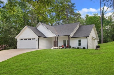 Enjoy peaceful living with golf course views in this beautifully on Rayburn Country Club in Texas - for sale on GolfHomes.com, golf home, golf lot