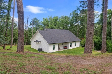 Enjoy peaceful living with golf course views in this beautifully on Rayburn Country Club in Texas - for sale on GolfHomes.com, golf home, golf lot