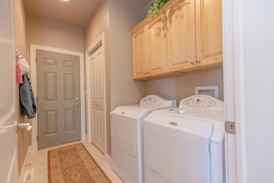 This Exceptional Twin Home sits on a picturesque lot overlooking on Emerald Hills Golf Club in Iowa - for sale on GolfHomes.com, golf home, golf lot