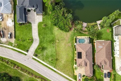 Beautiful, lake front buildable lot in the highly desirable on Grand Haven Golf Club in Florida - for sale on GolfHomes.com, golf home, golf lot