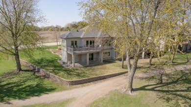 This Exceptional Twin Home sits on a picturesque lot overlooking on Emerald Hills Golf Club in Iowa - for sale on GolfHomes.com, golf home, golf lot