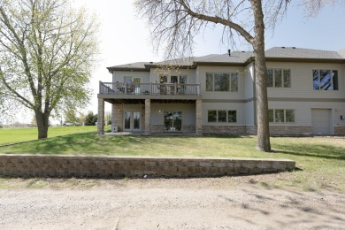 This Exceptional Twin Home sits on a picturesque lot overlooking on Emerald Hills Golf Club in Iowa - for sale on GolfHomes.com, golf home, golf lot