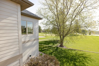 This Exceptional Twin Home sits on a picturesque lot overlooking on Emerald Hills Golf Club in Iowa - for sale on GolfHomes.com, golf home, golf lot