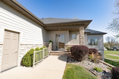 This Exceptional Twin Home sits on a picturesque lot overlooking on Emerald Hills Golf Club in Iowa - for sale on GolfHomes.com, golf home, golf lot