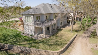 This Exceptional Twin Home sits on a picturesque lot overlooking on Emerald Hills Golf Club in Iowa - for sale on GolfHomes.com, golf home, golf lot