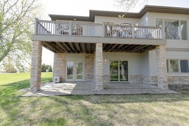This Exceptional Twin Home sits on a picturesque lot overlooking on Emerald Hills Golf Club in Iowa - for sale on GolfHomes.com, golf home, golf lot