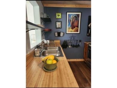 Rare ground-level 2 bed, 2 bath condo with carport and extra on Indian Hills Country Club in Arkansas - for sale on GolfHomes.com, golf home, golf lot