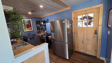 Rare ground-level 2 bed, 2 bath condo with carport and extra on Indian Hills Country Club in Arkansas - for sale on GolfHomes.com, golf home, golf lot