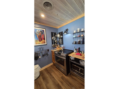 Rare ground-level 2 bed, 2 bath condo with carport and extra on Indian Hills Country Club in Arkansas - for sale on GolfHomes.com, golf home, golf lot