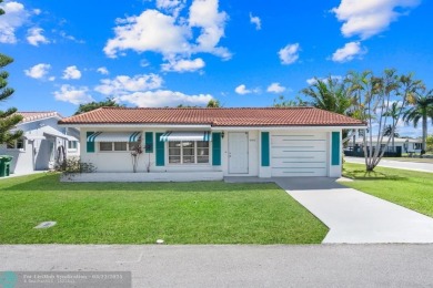 Beautiful 2 bed, 1 bath, garage corner lot with pleasant, quaint on Woodlands Country Club in Florida - for sale on GolfHomes.com, golf home, golf lot