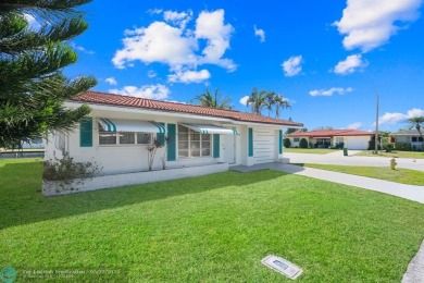 Beautiful 2 bed, 1 bath, garage corner lot with pleasant, quaint on Woodlands Country Club in Florida - for sale on GolfHomes.com, golf home, golf lot