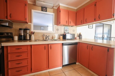 Discover coastal living at its finest in this charming 3-bedroom on Eagle Nest Golf Club in South Carolina - for sale on GolfHomes.com, golf home, golf lot