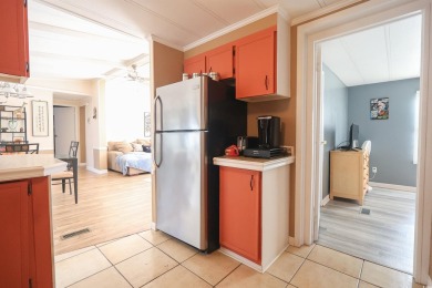 Discover coastal living at its finest in this charming 3-bedroom on Eagle Nest Golf Club in South Carolina - for sale on GolfHomes.com, golf home, golf lot