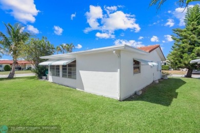 Beautiful 2 bed, 1 bath, garage corner lot with pleasant, quaint on Woodlands Country Club in Florida - for sale on GolfHomes.com, golf home, golf lot