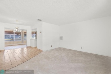 Beautiful 2 bed, 1 bath, garage corner lot with pleasant, quaint on Woodlands Country Club in Florida - for sale on GolfHomes.com, golf home, golf lot