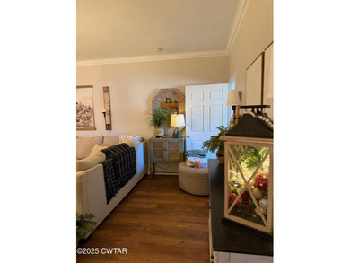 Wonderful 4BR 3BA, 2 car garage, fenced back yard with pergola on Dyersburg Country Club At The Farms in Tennessee - for sale on GolfHomes.com, golf home, golf lot