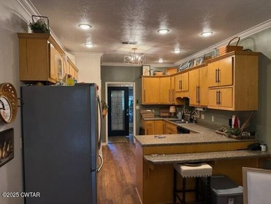 Wonderful 4BR 3BA, 2 car garage, fenced back yard with pergola on Dyersburg Country Club At The Farms in Tennessee - for sale on GolfHomes.com, golf home, golf lot