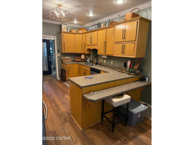 Wonderful 4BR 3BA, 2 car garage, fenced back yard with pergola on Dyersburg Country Club At The Farms in Tennessee - for sale on GolfHomes.com, golf home, golf lot