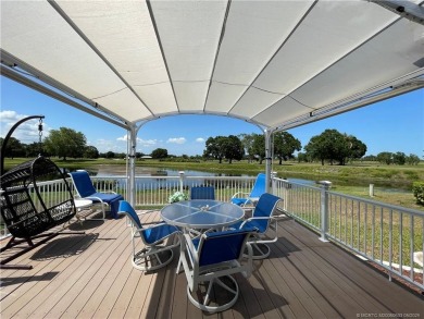 Exquisite home w/a lake & golf course view! Metal roof 3 yrs old on Indianwood Golf and Country Club in Florida - for sale on GolfHomes.com, golf home, golf lot