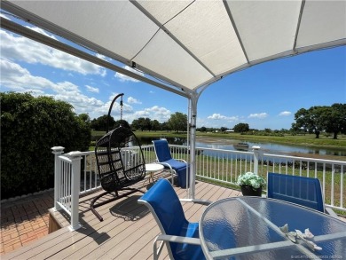 Exquisite home w/a lake & golf course view! Metal roof 3 yrs old on Indianwood Golf and Country Club in Florida - for sale on GolfHomes.com, golf home, golf lot
