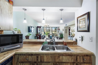 Fabulous Opportunity: charming one-story corner townhome in on Pembroke Lakes Golf Club in Florida - for sale on GolfHomes.com, golf home, golf lot