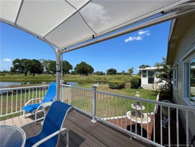 Exquisite home w/a lake & golf course view! Metal roof 3 yrs old on Indianwood Golf and Country Club in Florida - for sale on GolfHomes.com, golf home, golf lot