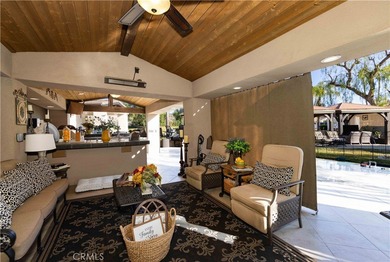 Check out the gated entry to this incredible waterfront on Rancho California RV Resort in California - for sale on GolfHomes.com, golf home, golf lot