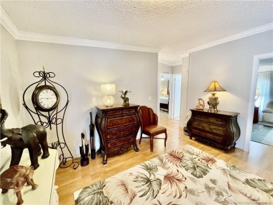 Exquisite home w/a lake & golf course view! Metal roof 3 yrs old on Indianwood Golf and Country Club in Florida - for sale on GolfHomes.com, golf home, golf lot