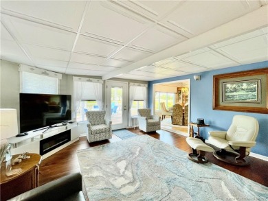 Exquisite home w/a lake & golf course view! Metal roof 3 yrs old on Indianwood Golf and Country Club in Florida - for sale on GolfHomes.com, golf home, golf lot