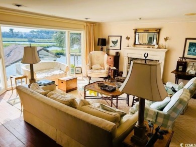 Welcome to 75 Marsh Hen Drive, a truly exceptional creekfront on Pawleys Plantation Golf and Country Club in South Carolina - for sale on GolfHomes.com, golf home, golf lot