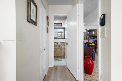 Fabulous Opportunity: charming one-story corner townhome in on Pembroke Lakes Golf Club in Florida - for sale on GolfHomes.com, golf home, golf lot