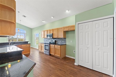 Under contract-accepting backup offers. One or more photo(s) has on Ridgewood Lakes Golf and Country Club in Florida - for sale on GolfHomes.com, golf home, golf lot