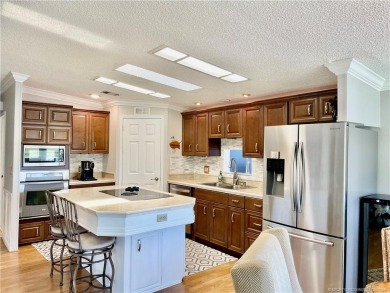 Exquisite home w/a lake & golf course view! Metal roof 3 yrs old on Indianwood Golf and Country Club in Florida - for sale on GolfHomes.com, golf home, golf lot