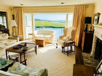 Welcome to 75 Marsh Hen Drive, a truly exceptional creekfront on Pawleys Plantation Golf and Country Club in South Carolina - for sale on GolfHomes.com, golf home, golf lot