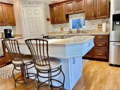 Exquisite home w/a lake & golf course view! Metal roof 3 yrs old on Indianwood Golf and Country Club in Florida - for sale on GolfHomes.com, golf home, golf lot