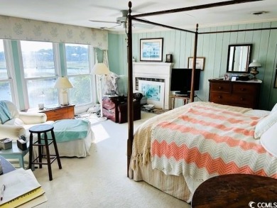 Welcome to 75 Marsh Hen Drive, a truly exceptional creekfront on Pawleys Plantation Golf and Country Club in South Carolina - for sale on GolfHomes.com, golf home, golf lot