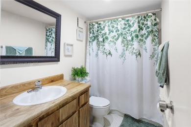 Fabulous Opportunity: charming one-story corner townhome in on Pembroke Lakes Golf Club in Florida - for sale on GolfHomes.com, golf home, golf lot