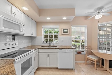 This elegant first-floor 3-bedroom, 2-bathroom condominium on Worthington Country Club in Florida - for sale on GolfHomes.com, golf home, golf lot