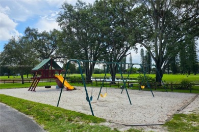 Fabulous Opportunity: charming one-story corner townhome in on Pembroke Lakes Golf Club in Florida - for sale on GolfHomes.com, golf home, golf lot