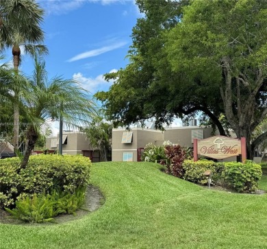 Fabulous Opportunity: charming one-story corner townhome in on Pembroke Lakes Golf Club in Florida - for sale on GolfHomes.com, golf home, golf lot