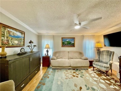 Exquisite home w/a lake & golf course view! Metal roof 3 yrs old on Indianwood Golf and Country Club in Florida - for sale on GolfHomes.com, golf home, golf lot
