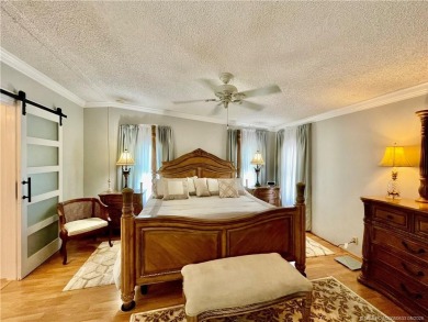 Exquisite home w/a lake & golf course view! Metal roof 3 yrs old on Indianwood Golf and Country Club in Florida - for sale on GolfHomes.com, golf home, golf lot