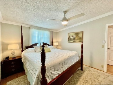Exquisite home w/a lake & golf course view! Metal roof 3 yrs old on Indianwood Golf and Country Club in Florida - for sale on GolfHomes.com, golf home, golf lot